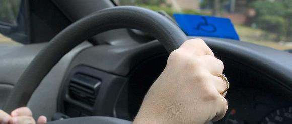 Car windshield with disabled user badge