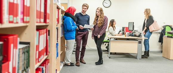 Graduate students in careers centre.