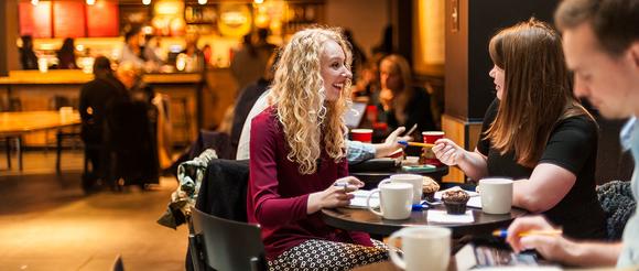 Students sitting in Starbucks on campus