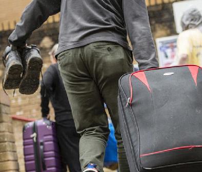 Student moving luggage