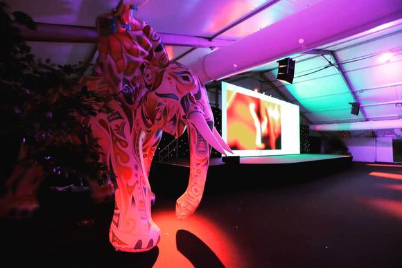 An elephant decoration in front of the big screen in The Marquee