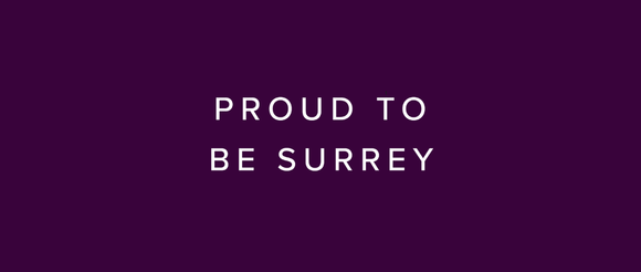 White text on purple background saying Proud to be Surrey