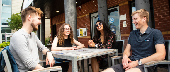 Group of students sitting at a table